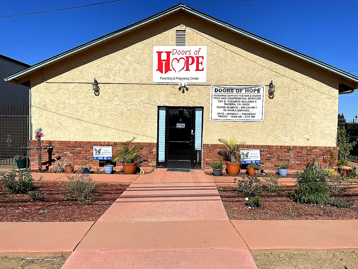 The Doors of Hope center on East Yosemite Avenue in Madera, CA, with its signage above the entrance